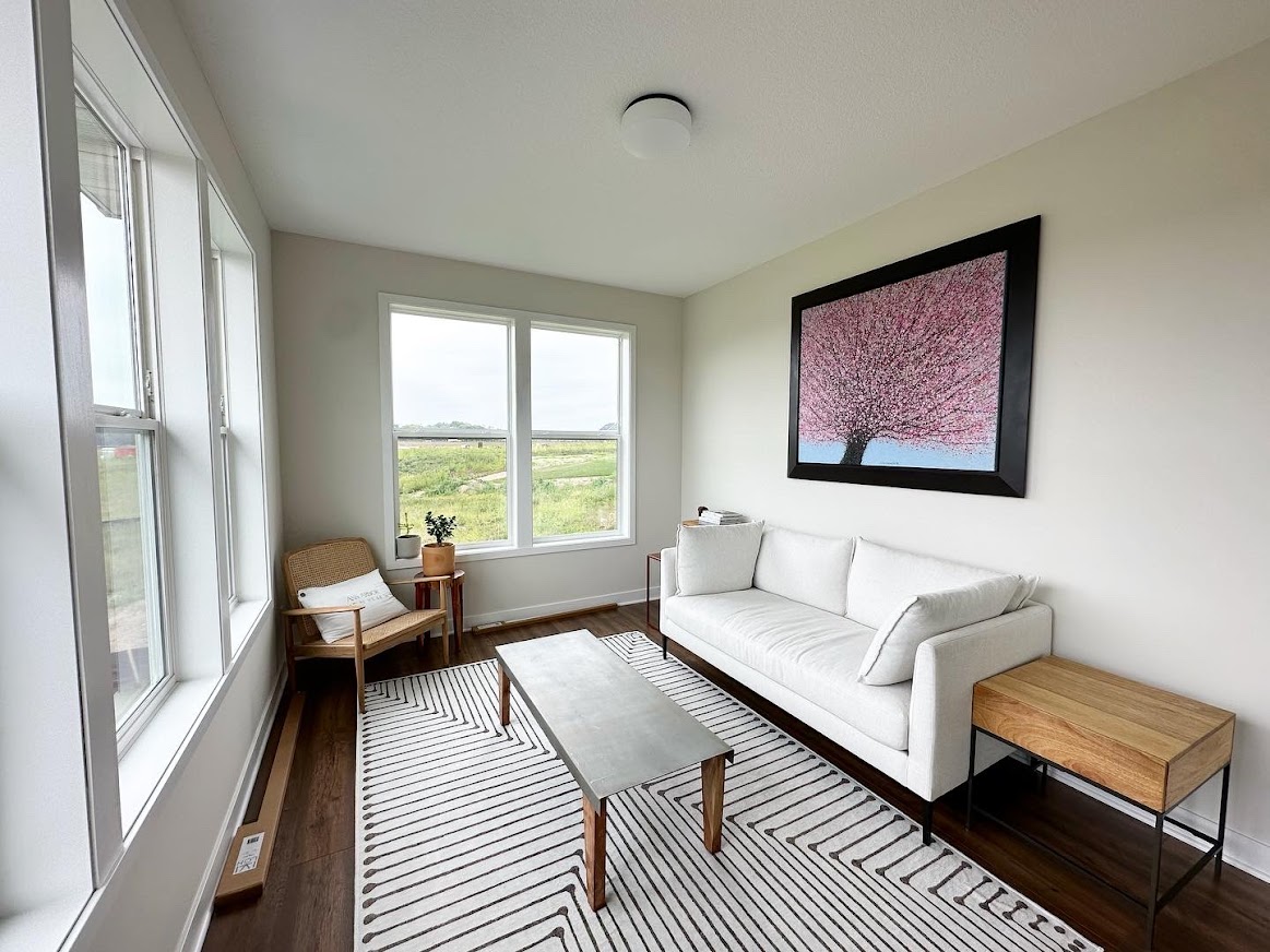 Recurring residential cleaning for a maintained living room in a Woodbury home